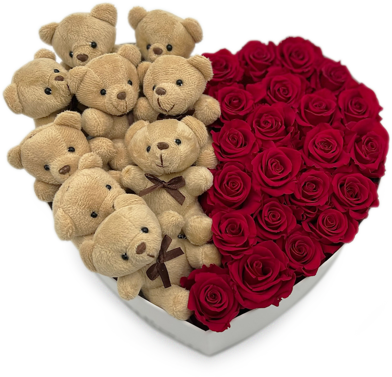 Heart-shaped arrangement of teddy bears and red roses in white heart box